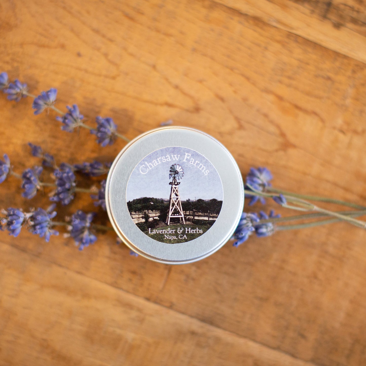Lavender salve in a tin with a Charsaw Farms logo
